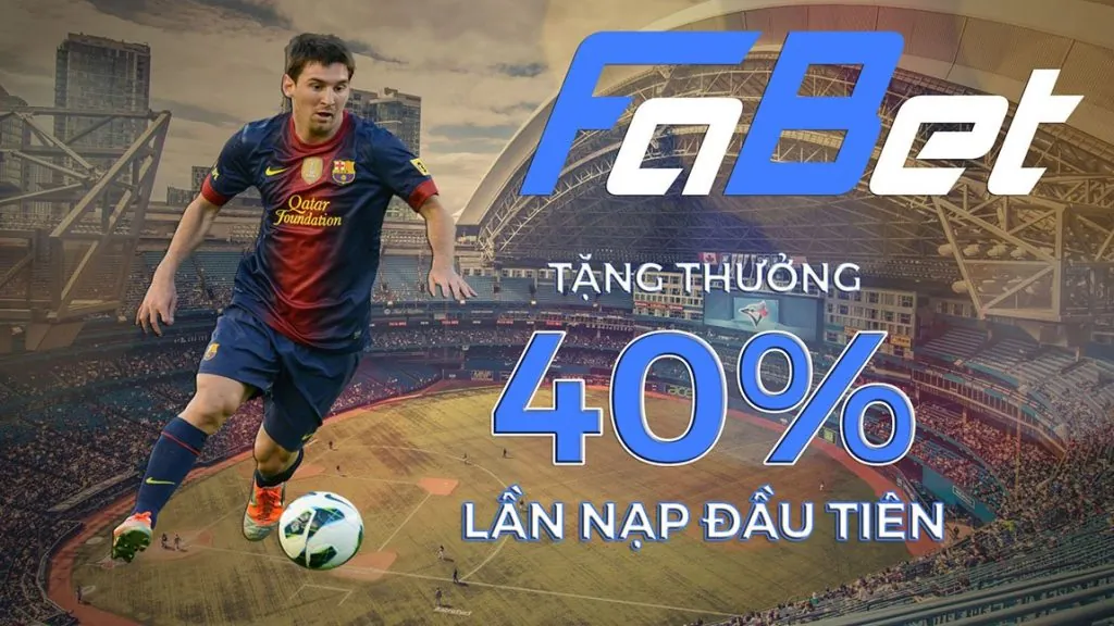 Vận động viên tennis đang giao bóng trên sân đất nện